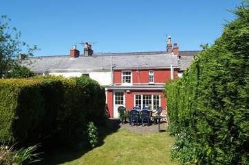 The south-facing back garden is surprisingly private and a real sun-trap in summer.