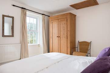The double bedroom overlooks the lane and over the roof tops to the countryside beyond.