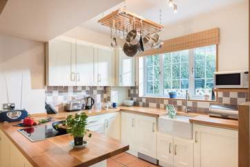 The kitchen overlooks the garden.