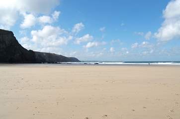 Chapel Porth at low tide - a superb surfing beach.