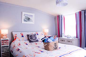 The bedroom is cosy and warm.