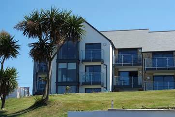Porthia Blue is on the first floor of these prestigious apartments - there is level access from the main entrance and a lift is available (there are steps from the car park entrance).