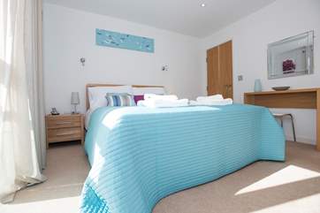 The double bedroom is spacious and comfortable.