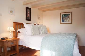 The lovely ground floor bedroom has sumptuous linens and a wonderfully comfortable mattress.
