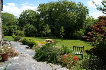 The grounds are full of mature bedding plants.