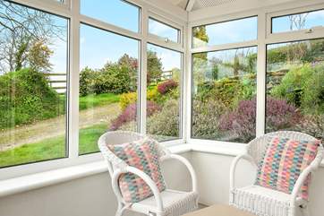 The sunny conservatory leads off from the double bedroom