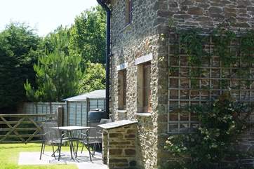 The sitting-area for Millers at the side of the cottage, with lovely views over farmland.