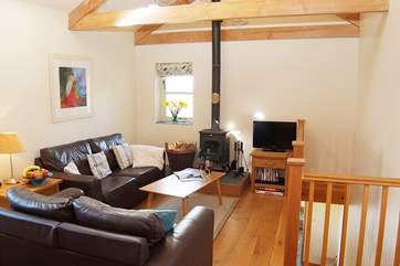The living-room has lovely far reaching countryside views.