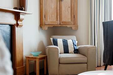 The great sitting-room with additional seating to enjoy the sea views.