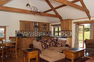 The beautifully furnished open plan living-room.