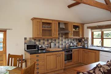 The well-equipped oak fitted kitchen.