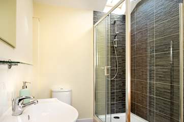 The bathroom also has a stylish shower