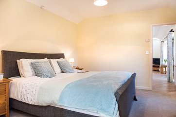 The bedroom has a super comfy 6' kingisze bed