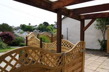 The view from the kitchen door across the patio towards the village.