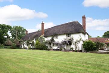 This is the whole farmhouse. The owner lives at the far left-hand end and gives you complete privacy. Your patio and side garden are tucked to the right of the cottage and are not overlooked at all.