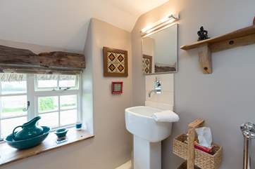 Even the bathroom is styled with beautiful detatils to add colour.