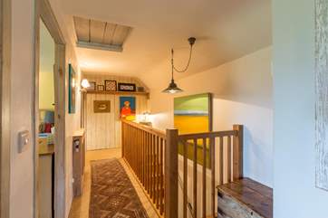 Even the landing is an attractive feature. For a very old cottage the interior is deceptively spacious.