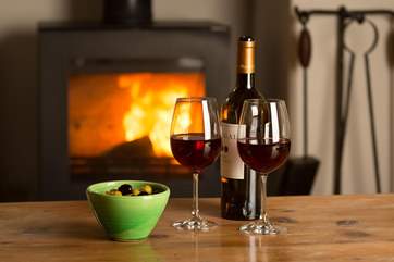 The wood-burning stove adds that special touch of character and atmosphere.