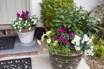 Your own doorstep garden adds to the welcome when you arrive.