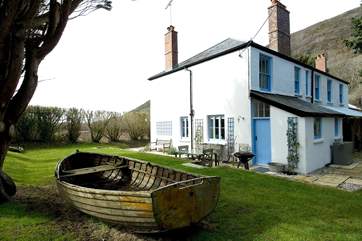 Meadowgate has a delightful garden complete with play boat!
