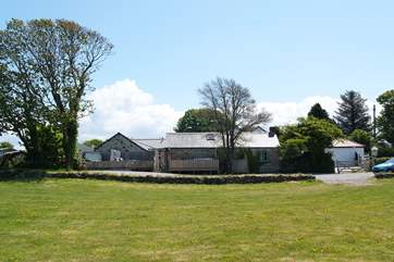 Looking back at the cottages from the meadow - which is ideal for exercising your four-legged companions!
