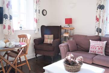 Room to dine, relax and cook all a comfy space.
