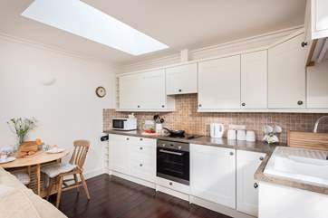 Room to cook and dine in this open plan living, eating, relaxing space.