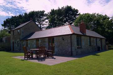 Treboast Skyber has a large, virtually level lawned garden with wonderful views across the surrounding fields and countryside.