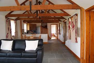 The two ground floor en suite bedrooms are at either end of the living-room.
