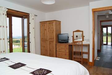Bedroom 1 has a bathroom next to it, which becomes en suite when the door into the living-room is closed.