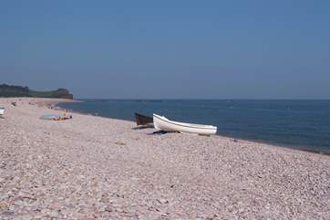 The long stretch of pebbled beach at Budleigh Salterton.