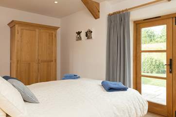You can lie in bed and look out into the orchard and have the French windows wide open to listen to the morning bird song.