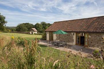 The Old Dairy is a beautiful detached barn conversion in an utterly tranquil setting on the edge of an orchard.