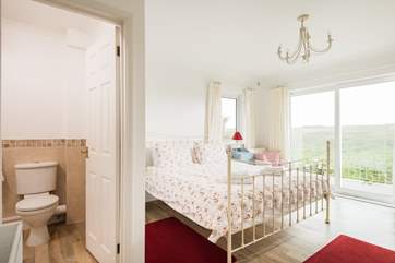 The master bedroom has an en suite shower-room.
