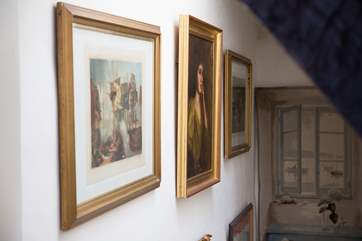 Impressive paintings on the walls of the staircase.