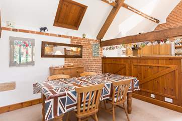 The dining area is separated from the kitchen area but this whole floor is open plan.