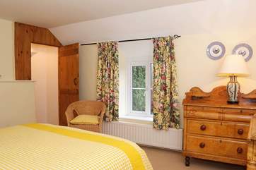 The en suite for the master bedroom (Bedroom 1) is through the door in the far corner.