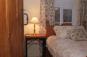 Looking along the upstairs landing into the twin bedroom (Bedroom 3).
