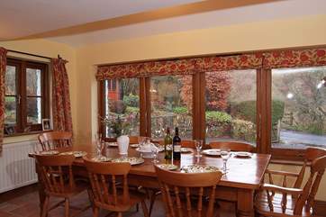French windows lead from this room out to the patio and garden beyond. Parking is off-road here, just in front of this room.