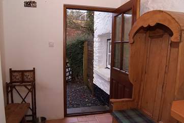 This lovely old settle is in the entrance-area just before you step up into the kitchen.