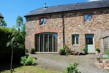 The Garden House is a luxurious modern barn conversion.