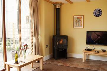 The cosy wood-burner will warm your toes and your wine!