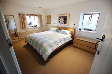 The gorgeous double bedroom is very spacious.