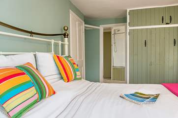 Bedroom 1 has direct access to the bathroom.