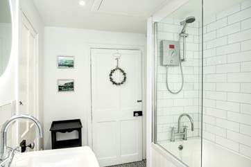 The cottage has a stylish bathroom