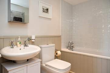 The delightful cottage bathroom is on the ground floor