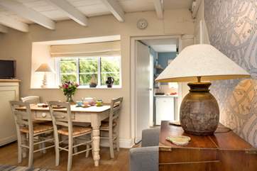 The kitchen leads off from the living room