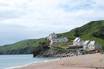 The property is set above Hallsands pebbled beach.