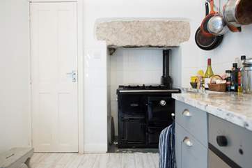 A gas fired Rayburn makes the kitchen homely and warm.