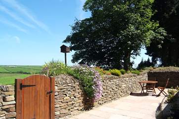 The courtyard at the rear is securely gated.
